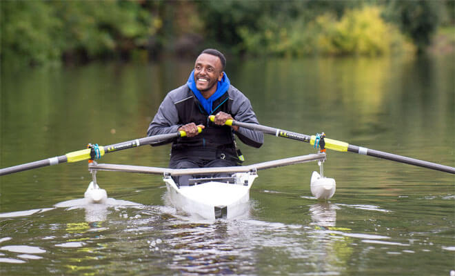 a photo of our client Ainsley rowing